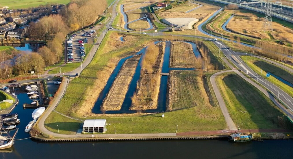 Luchtfoto van de beoogde havenlocatie bij Fort H